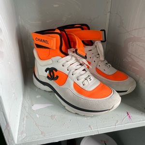 Chanel women's high top logo sneakers orange